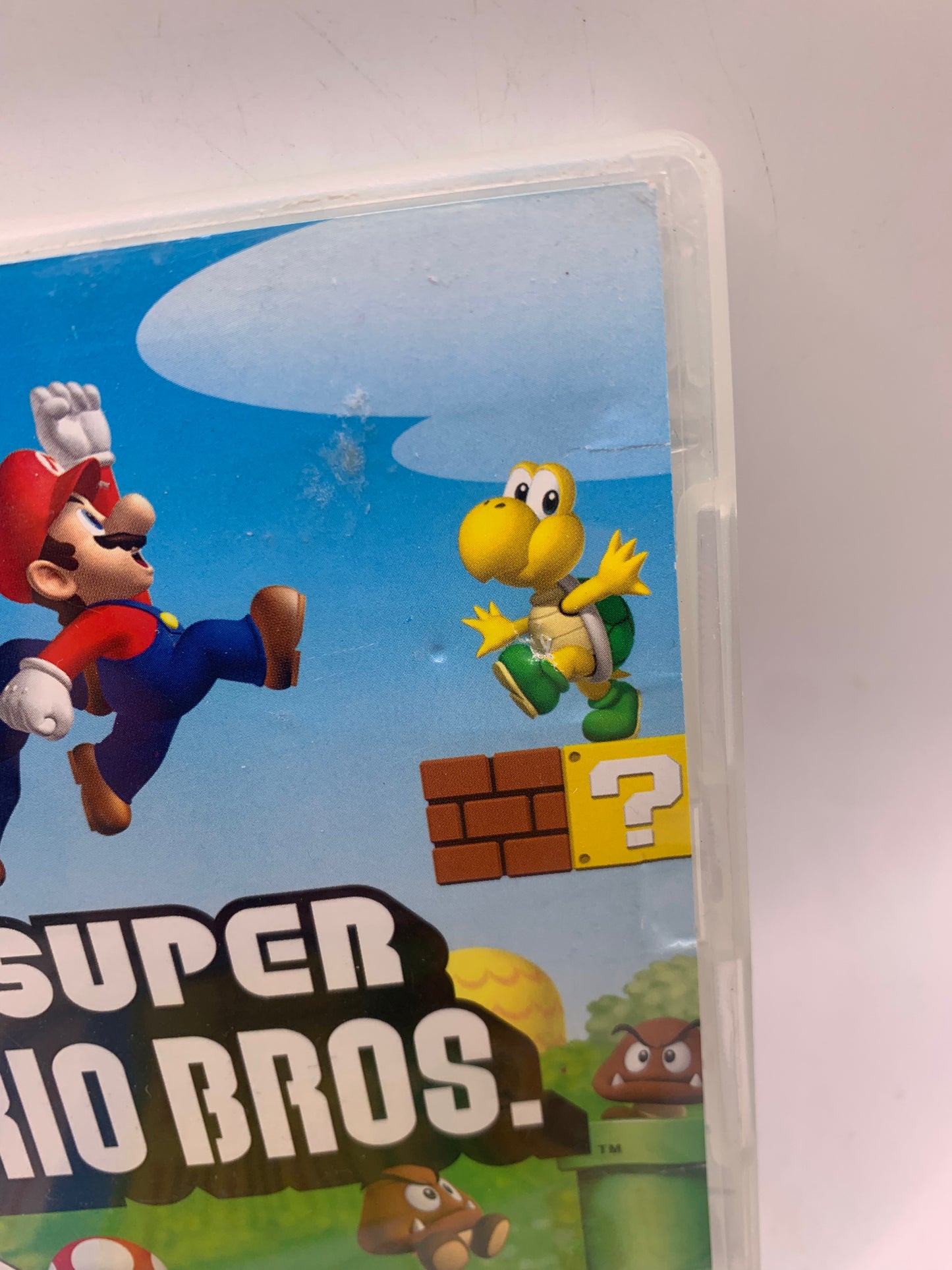 New Super Mario Bros. (Cover licht beschadigd) - Nintendo DS