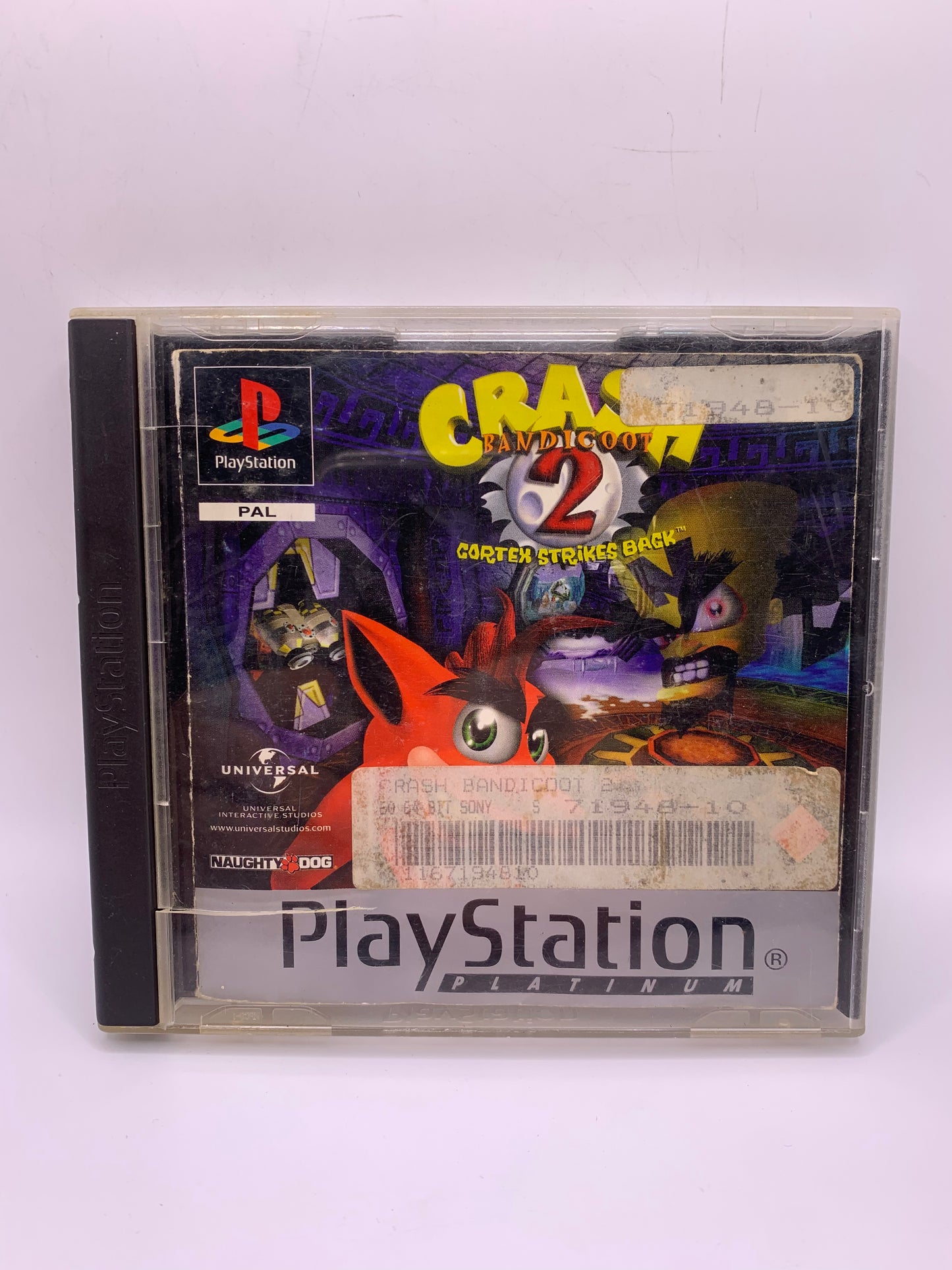 Crash Bandicoot 2: Cortex Strikes Back (Platinum, case zeer gebruikt, geen cover) – PlayStation