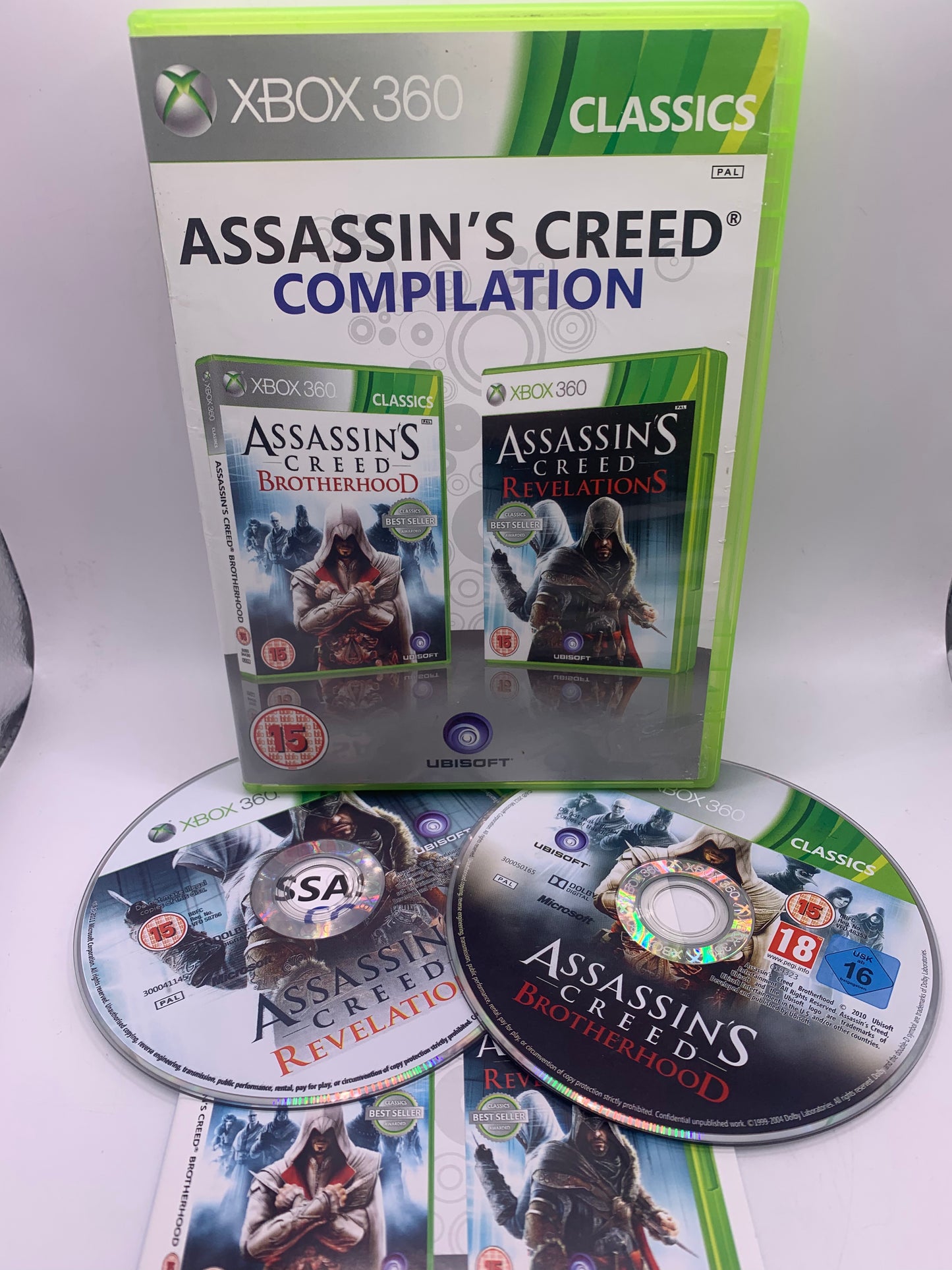 Assassin’s Creed Compilation (Case lict beschadigd) - Xbox 360