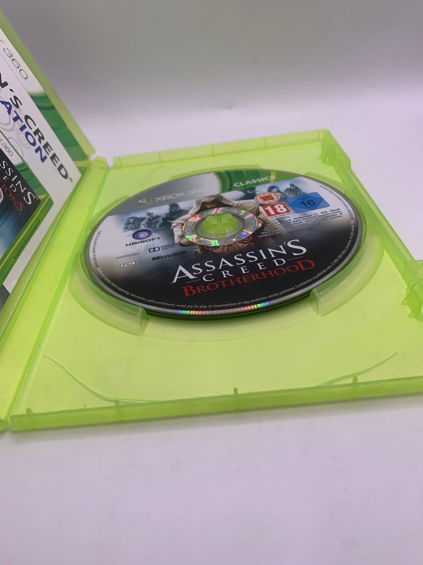 Assassin’s Creed Compilation (Case lict beschadigd) - Xbox 360